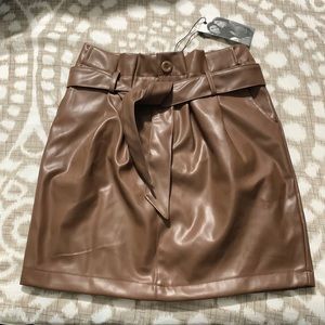 Leather skirt.